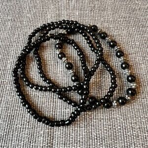 Elegant Black Beaded Four Piece Bracelet Set with Pewter Spacers